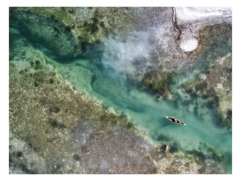 See Landschaft mit Kanu