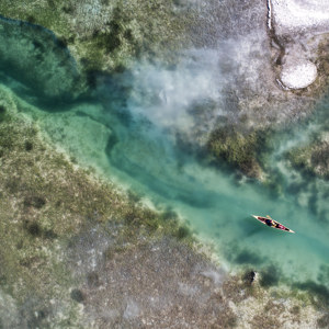 See Landschaft mit Kanu